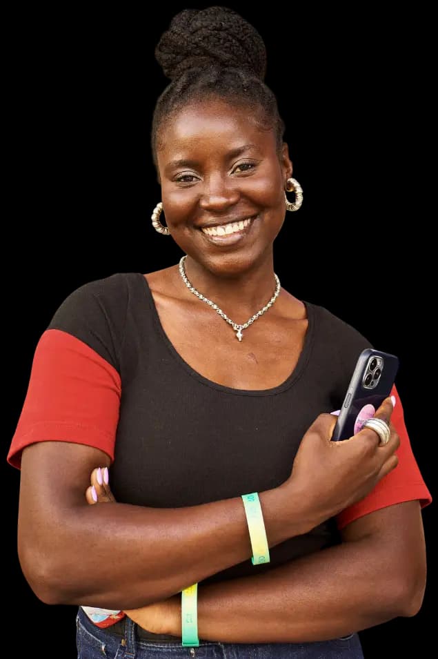 Happy Anjoh user holding a phone